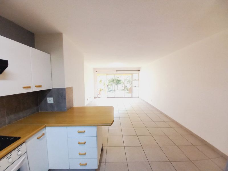 Secure and Immaculate Two-Bedroom Townhouse Offering Lifestyle Living at Eagles Nest - Photo 7