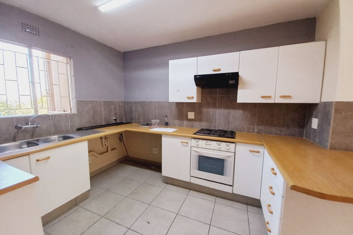 Secure and Immaculate Two-Bedroom Townhouse Offering Lifestyle Living at Eagles Nest - Photo 5