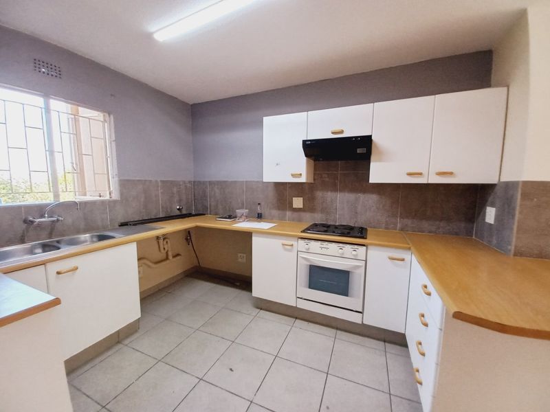 Secure and Immaculate Two-Bedroom Townhouse Offering Lifestyle Living at Eagles Nest - Photo 5