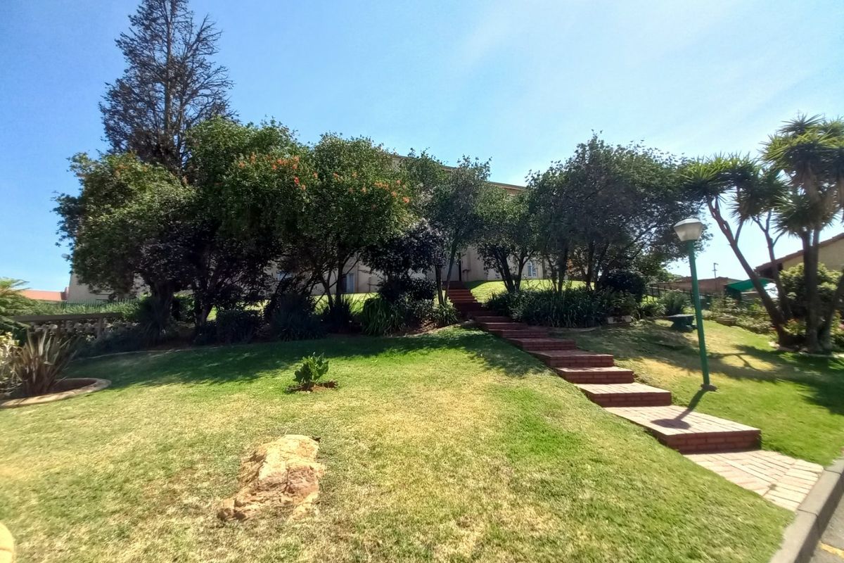 Secure and Immaculate Two-Bedroom Townhouse Offering Lifestyle Living at Eagles Nest - Photo 2