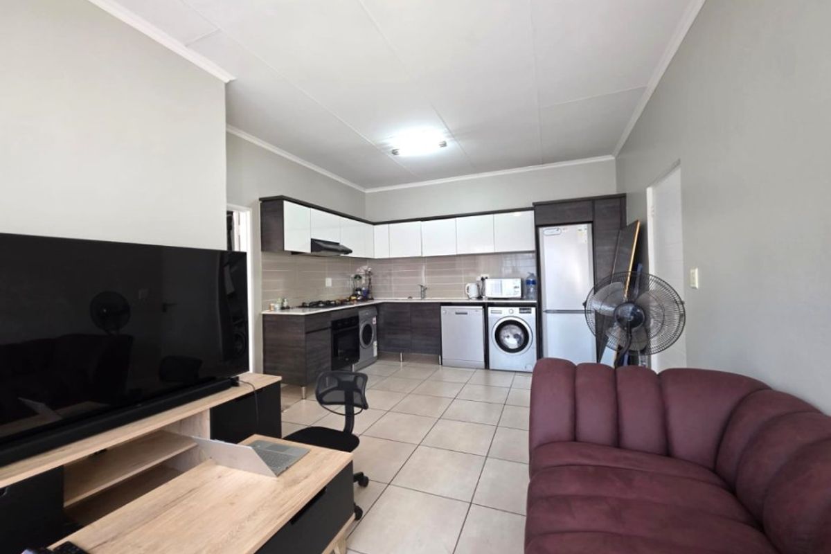 Modern 1-Bedroom Gem with Balcony in Secure Lifestyle Estate! - Photo 3