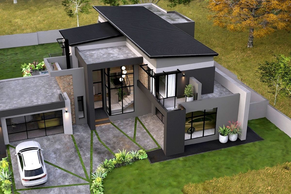 An aerial view of a modern architectural house design featuring a metal roof, stone accents, large glass windows, and a paved driveway.