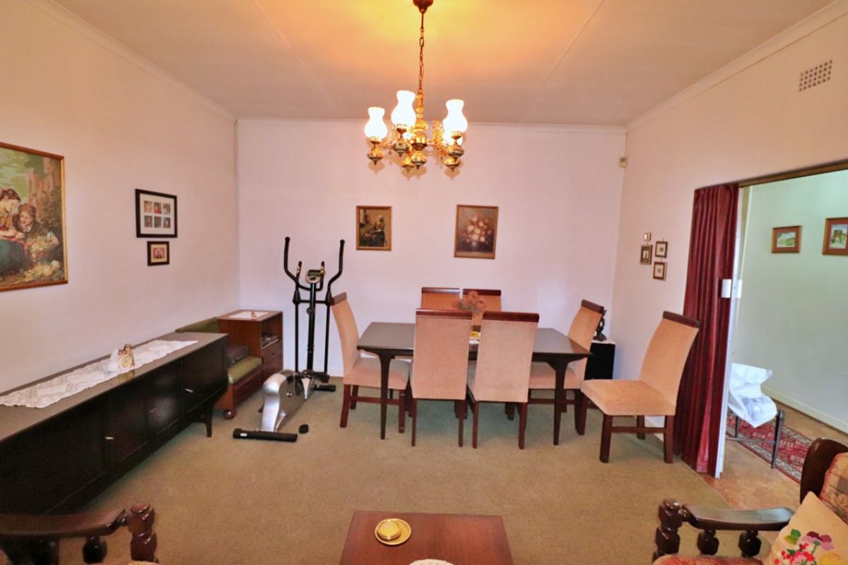 Spacious 6-Bedroom Home on a Corner Stand!  - Photo 5