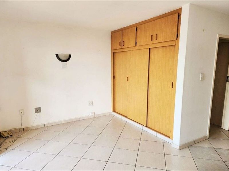 Stylish Compact Living with a Sparkling Pool Retreat - Photo 2