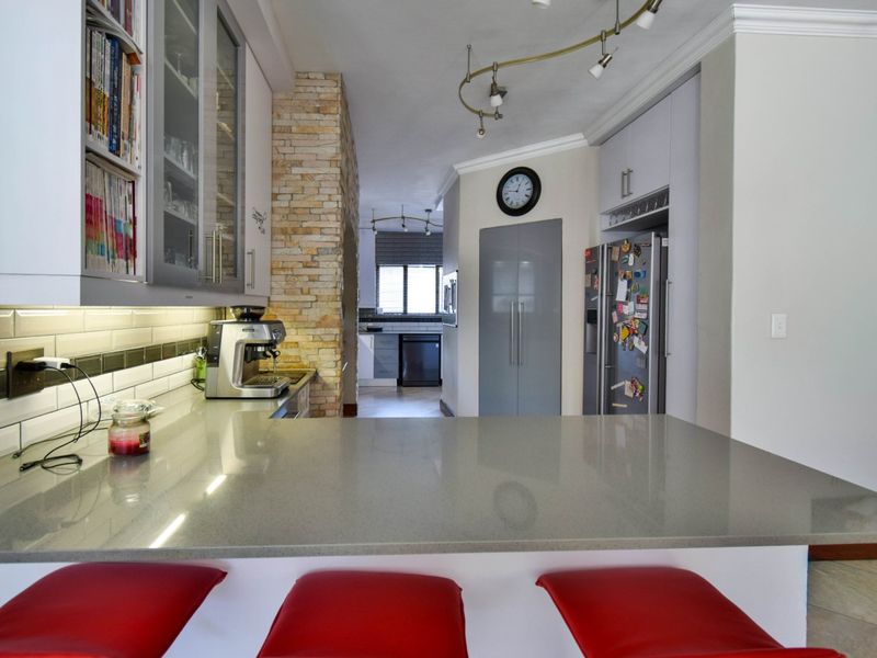 Pristine North-Facing Family Retreat with Expansive Living Spaces. - Photo 8