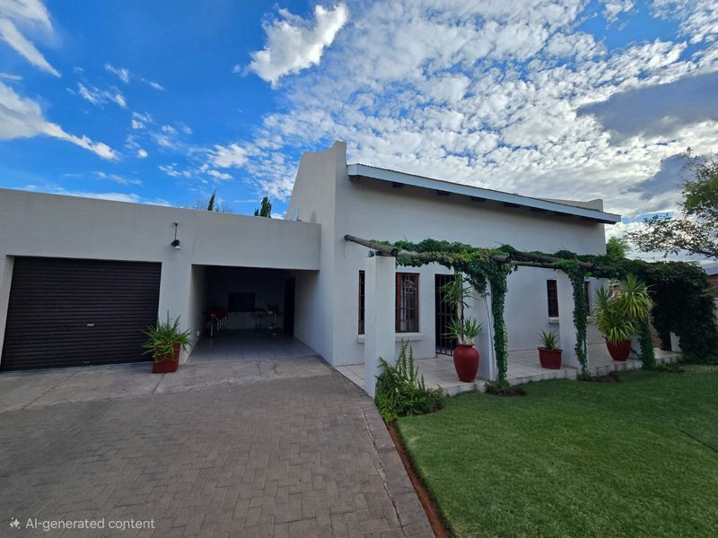 Front view of the property featuring a paved driveway, attached garage, and a covered patio area with a pergola structure.