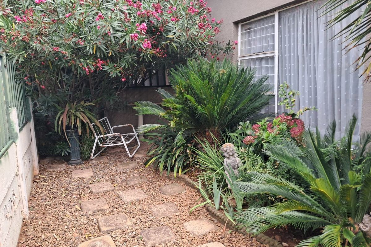Generous Family Living with Versatile Spaces and Charming Garden in Krugersdorp West - Photo 2