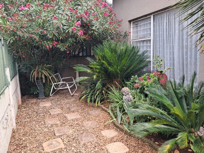 Generous Family Living with Versatile Spaces and Charming Garden in Krugersdorp West - Photo 2
