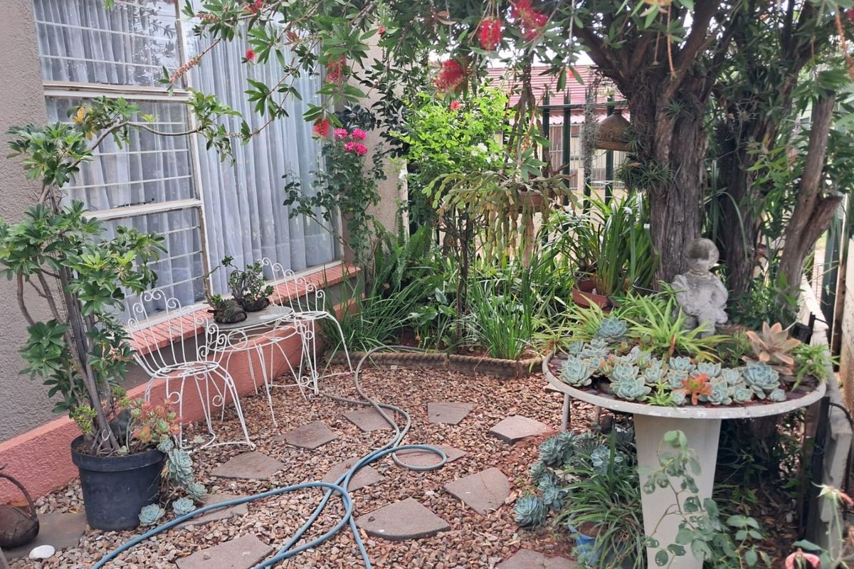 Generous Family Living with Versatile Spaces and Charming Garden in Krugersdorp West - Photo 4