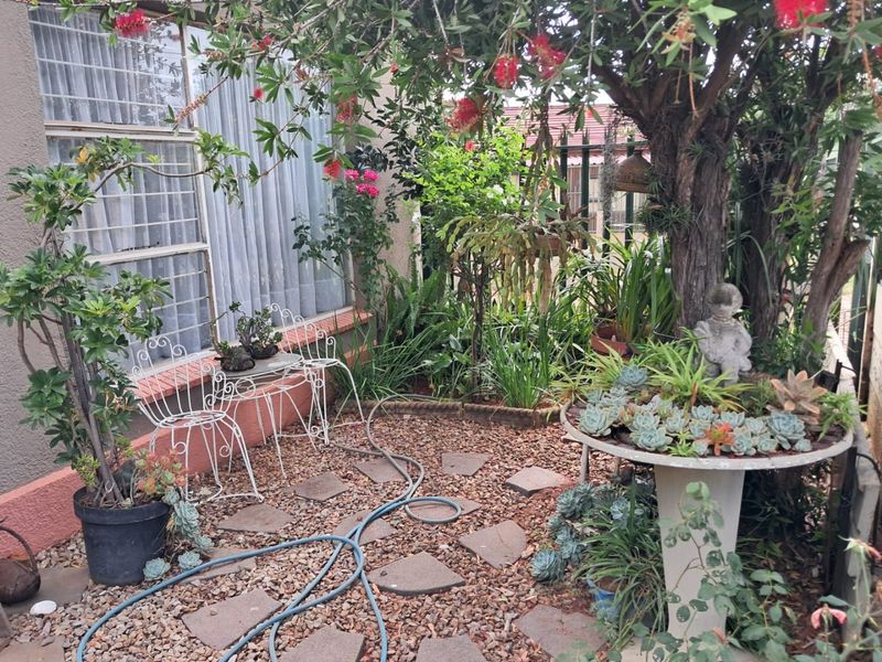 Generous Family Living with Versatile Spaces and Charming Garden in Krugersdorp West - Photo 4