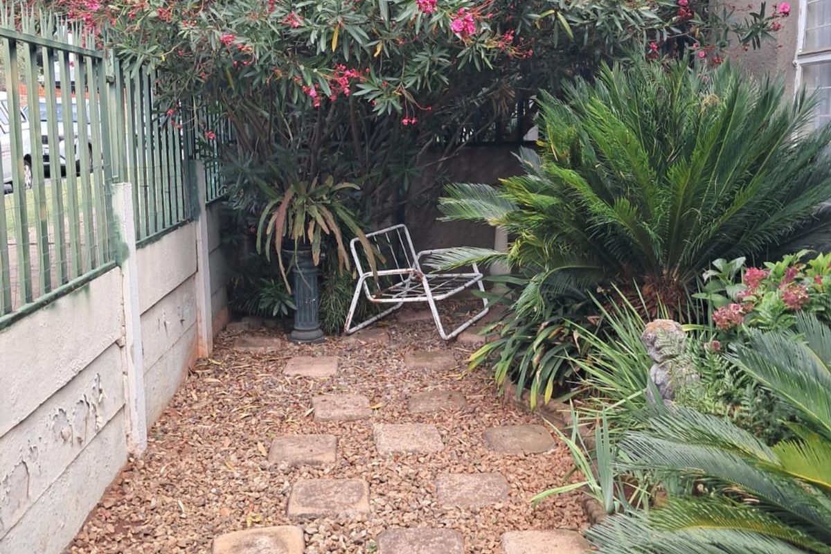 Generous Family Living with Versatile Spaces and Charming Garden in Krugersdorp West - Photo 3