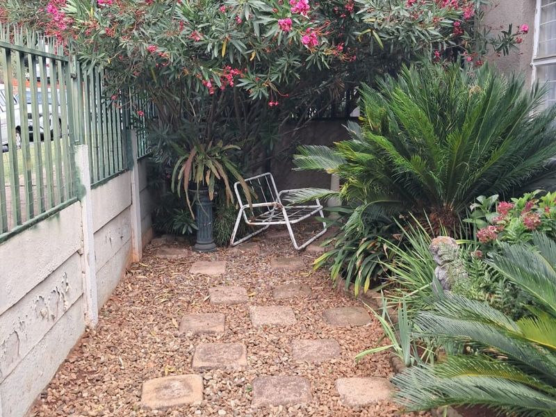 Generous Family Living with Versatile Spaces and Charming Garden in Krugersdorp West - Photo 3