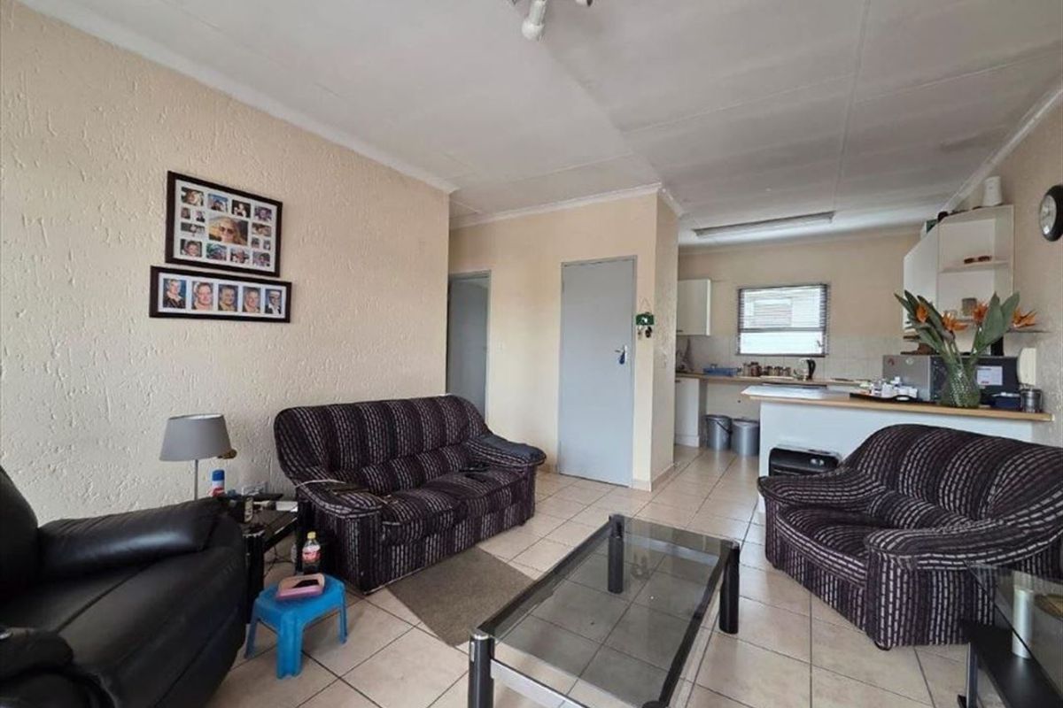 Cozy Two-Bedroom Home with Pool and Carport - Photo 2