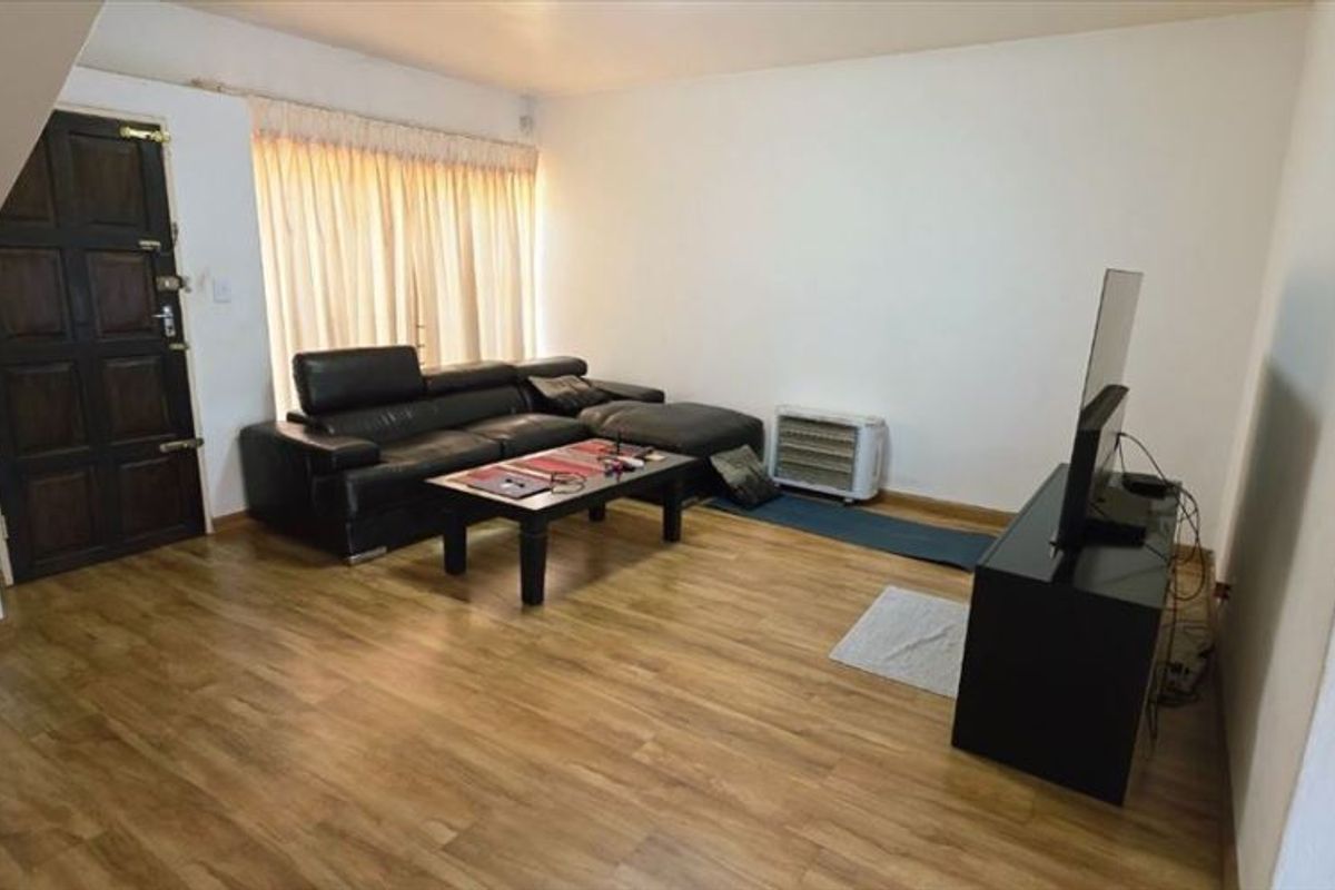 Spacious Three-Bedroom Home with Garage and Carport - Photo 2