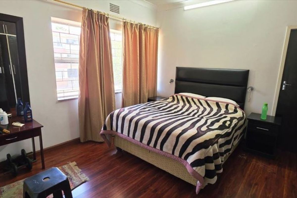 Spacious Three-Bedroom Home with Garage and Carport - Photo 3