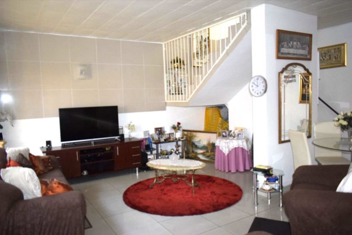 Elegant Two-Bedroom Home with En-Suites and Pool - Photo 2