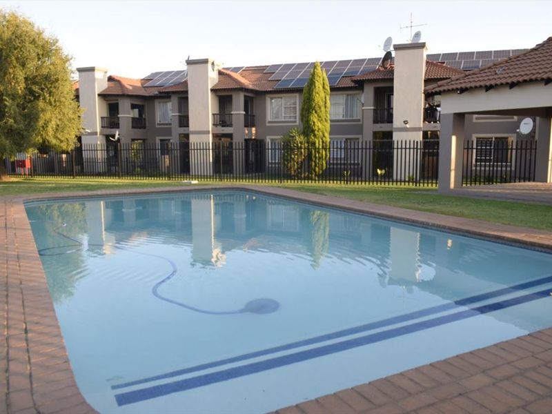 Elegant Two-Bedroom Home with En-Suites and Pool - Photo 3