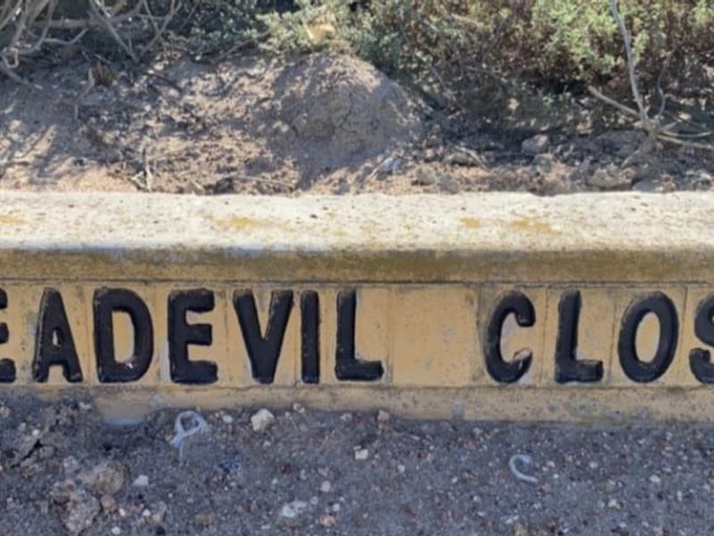 A close-up view of the street name signage for Seadevil Close, indicating the location of the residential property.