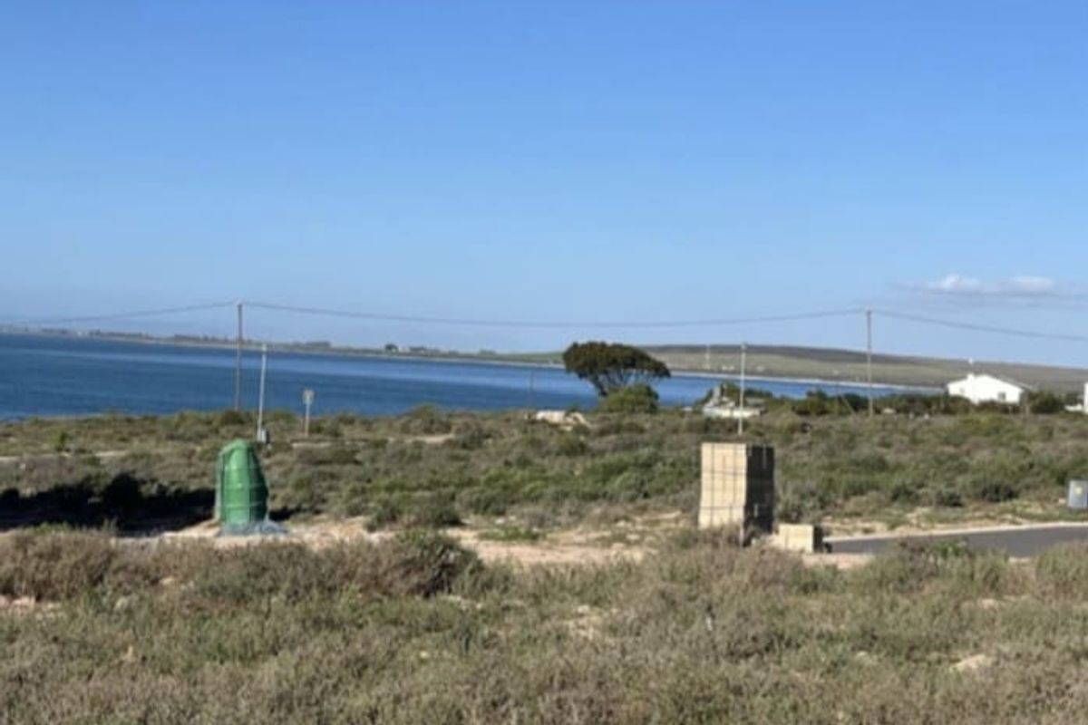 A scenic view of the coastal landscape and horizon from the vacant residential property.