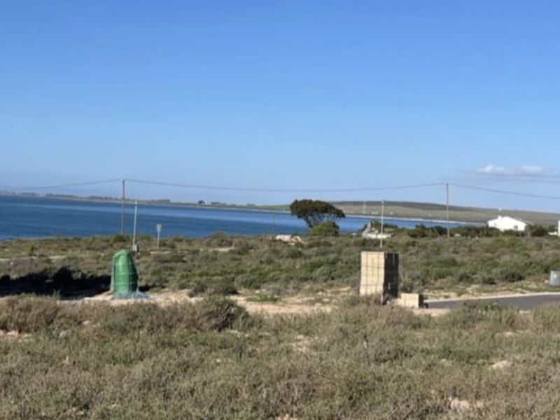 A scenic view of the coastal landscape and horizon from the vacant residential property.