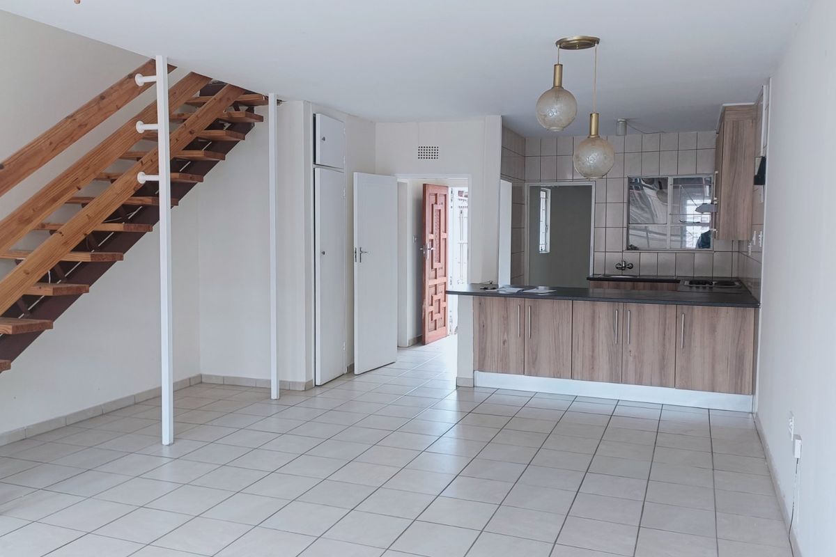 Nestled in the heart of charming Krugersdorp North, this delightful townhouse - Photo 5