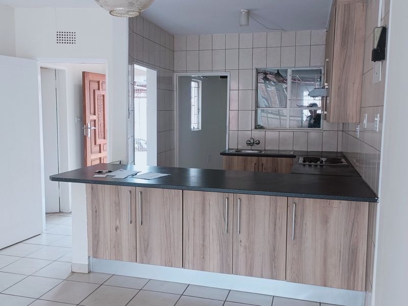 Nestled in the heart of charming Krugersdorp North, this delightful townhouse - Photo 4