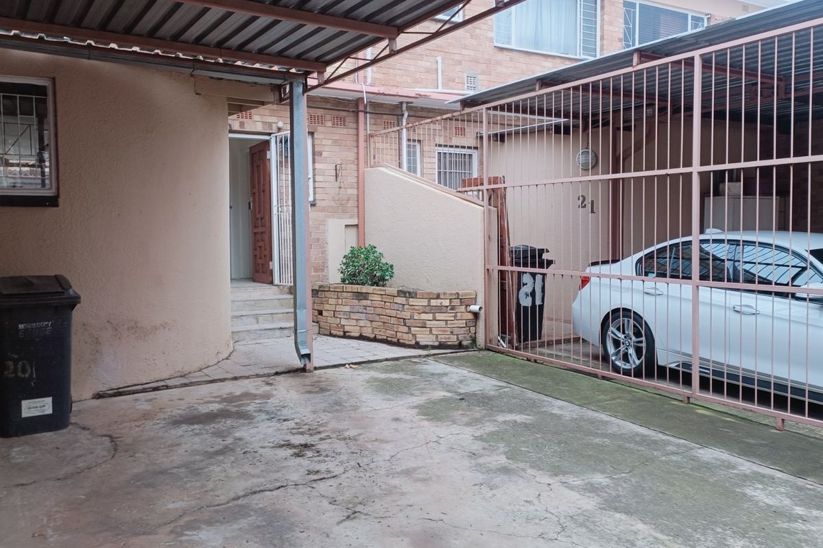 Nestled in the heart of charming Krugersdorp North, this delightful townhouse - Photo 2