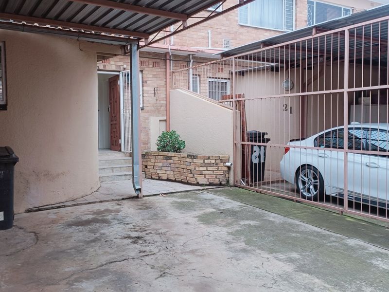 Nestled in the heart of charming Krugersdorp North, this delightful townhouse - Photo 2