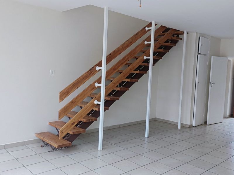 Nestled in the heart of charming Krugersdorp North, this delightful townhouse - Photo 7