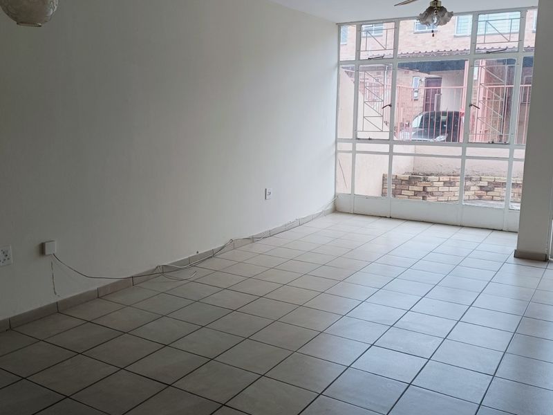 Nestled in the heart of charming Krugersdorp North, this delightful townhouse - Photo 6