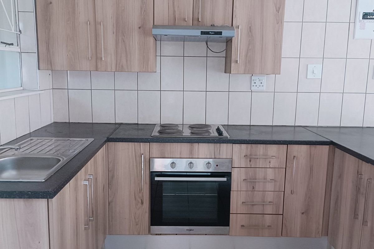 Nestled in the heart of charming Krugersdorp North, this delightful townhouse - Photo 3