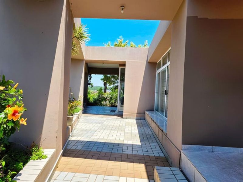 Discover Your Family's Forever Home in this Spacious 4-Bedroom Home with Poolside Joy, Spa Bath and Future Extension Potential - Photo 2