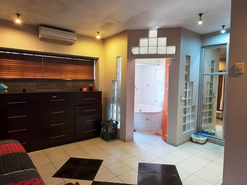 Discover Your Family's Forever Home in this Spacious 4-Bedroom Home with Poolside Joy, Spa Bath and Future Extension Potential - Photo 10