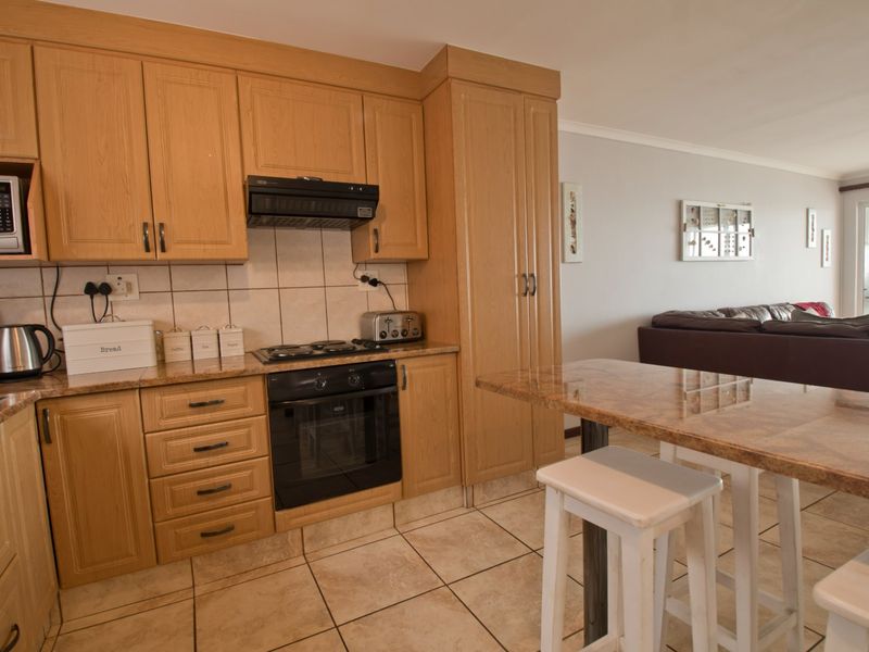 Ocean Views. Prime Location. Fully Furnished. Secure Living at Its Best. - Photo 5