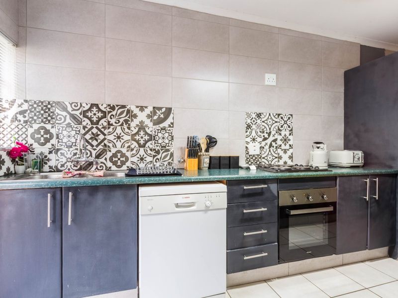 TOTALLY RENOVATED DUPLEX IN 24H MANNED SECURITY COMPLEX - Photo 2