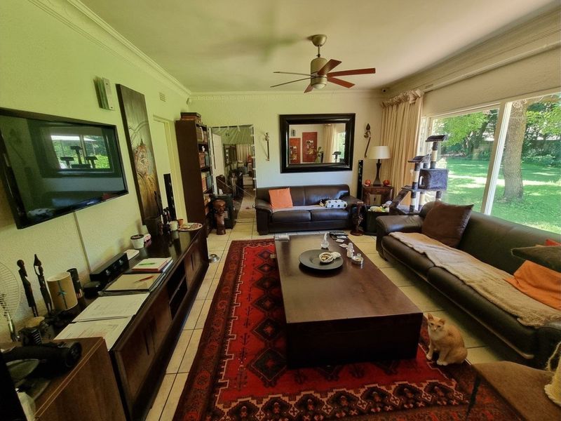 Beautiful Plot for Sale – Exceptional Investment Opportunity!  This beautiful and spacious plot offers the perfect combination of comfortable family living and outstanding rental income potential ideal for investors or extended families looking for space and security. Main House Features: 3 Spacious Bedrooms Large Loft Area (perfect for office, extra bedroom, or entertainment space) Generous Living Areas Beautiful, well-maintained home with plenty of character  Additional Features: 4 Garages Large Workshop Area Swimming Pool Very safe and secure property Expansive grounds with endless possibilities Income-Generating Potential: Townhouses on the property currently used for rental income Furnished bedroom units available to rent out Excellent opportunity for investors seeking multiple income streams This unique property offers space, versatility, and strong rental returns — all in one stunning setting. Perfect for investors, business owners, or families wanting additional income from home.  Don’t miss out on this rare opportunity — contact us today to arrange a viewing! - Photo 7