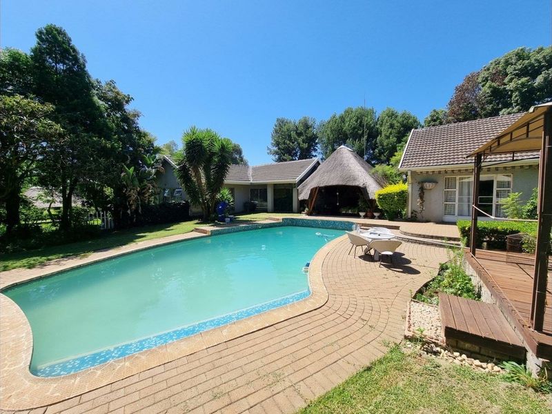 Beautiful Plot for Sale – Exceptional Investment Opportunity!  This beautiful and spacious plot offers the perfect combination of comfortable family living and outstanding rental income potential ideal for investors or extended families looking for space and security. Main House Features: 3 Spacious Bedrooms Large Loft Area (perfect for office, extra bedroom, or entertainment space) Generous Living Areas Beautiful, well-maintained home with plenty of character  Additional Features: 4 Garages Large Workshop Area Swimming Pool Very safe and secure property Expansive grounds with endless possibilities Income-Generating Potential: Townhouses on the property currently used for rental income Furnished bedroom units available to rent out Excellent opportunity for investors seeking multiple income streams This unique property offers space, versatility, and strong rental returns — all in one stunning setting. Perfect for investors, business owners, or families wanting additional income from home.  Don’t miss out on this rare opportunity — contact us today to arrange a viewing! - Photo 2