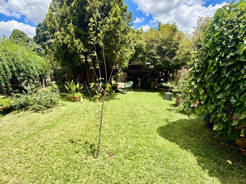 Spacious Family Home with Lush Garden, Workshop & Versatile Living Space - Photo 4