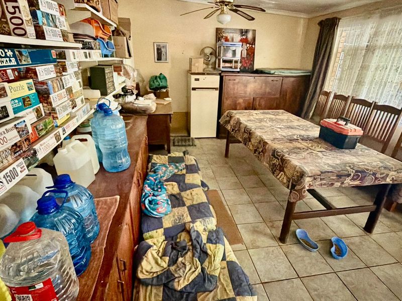 Spacious Family Home with Lush Garden, Workshop & Versatile Living Space - Photo 10