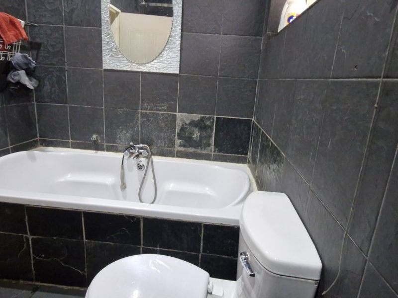 Spacious 4-Bedroom Family Home with Granny Flat & Entertainment Area - Photo 8