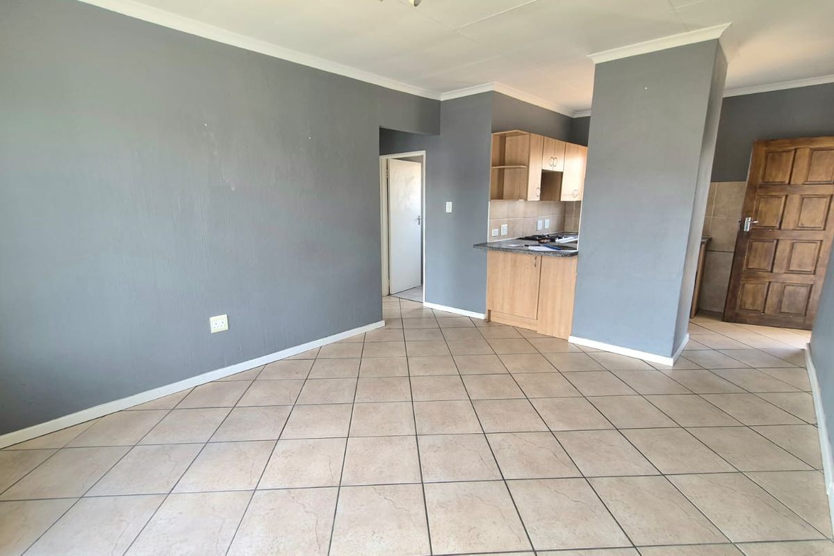 Priced to Sell – Secure 2-Bedroom Starter Apartment! - Photo 5