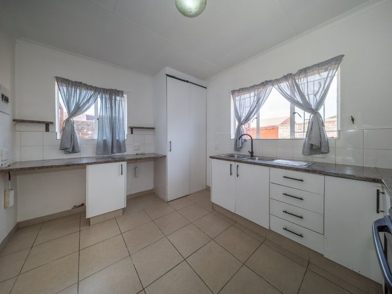 Effortless Living in a Secure Edenglen Estate! Your Perfect Lock-Up-and-Go Home - Photo 9