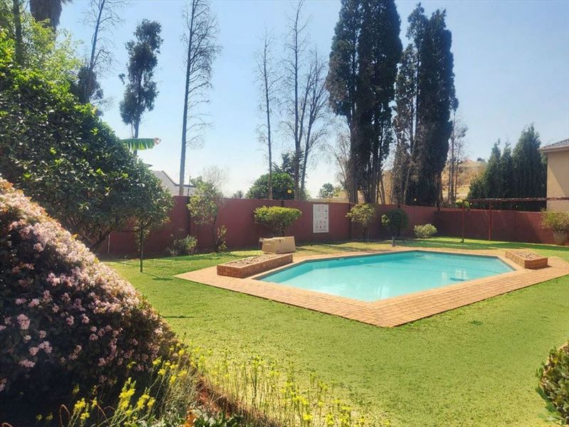 Cozy Retreat with Sparkling Pool and Comfortable Living - Photo 3