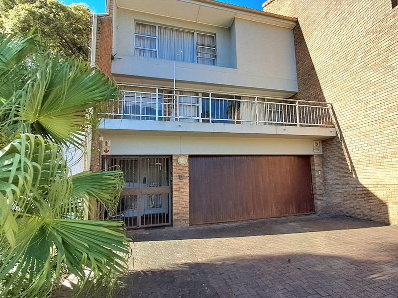 Maintenance free, lock-up and go, spacious solid townhouse in secure complex close to Beacon Bay Country Club - Photo 1
