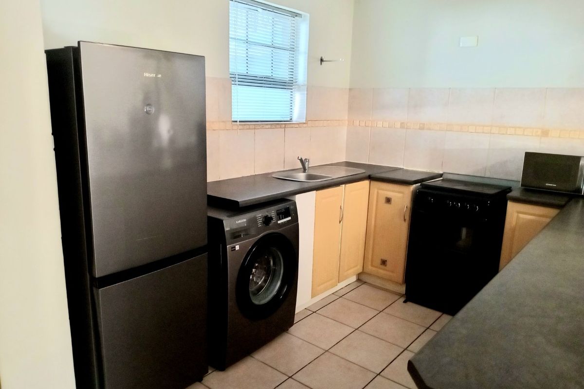 Secure and Well Located Two Bedroom Apartment - Photo 4