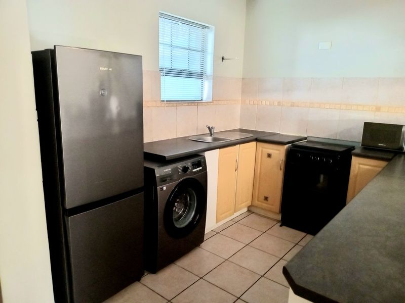 Secure and Well Located Two Bedroom Apartment - Photo 4