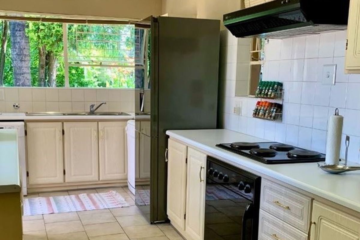 Neat & Spacious Family Home in Secure Enclosure - Photo 3