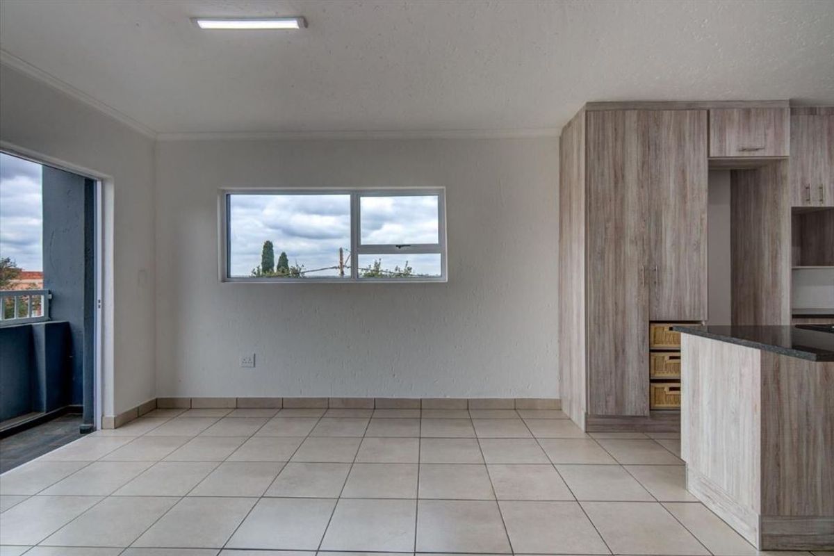 Neat Two-Bedroom Home with Welcoming Living Spaces - Photo 2