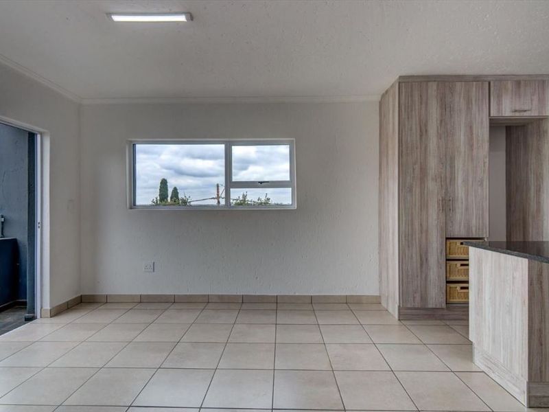 Neat Two-Bedroom Home with Welcoming Living Spaces - Photo 2