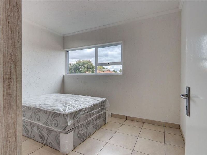 Neat Two-Bedroom Home with Welcoming Living Spaces - Photo 3